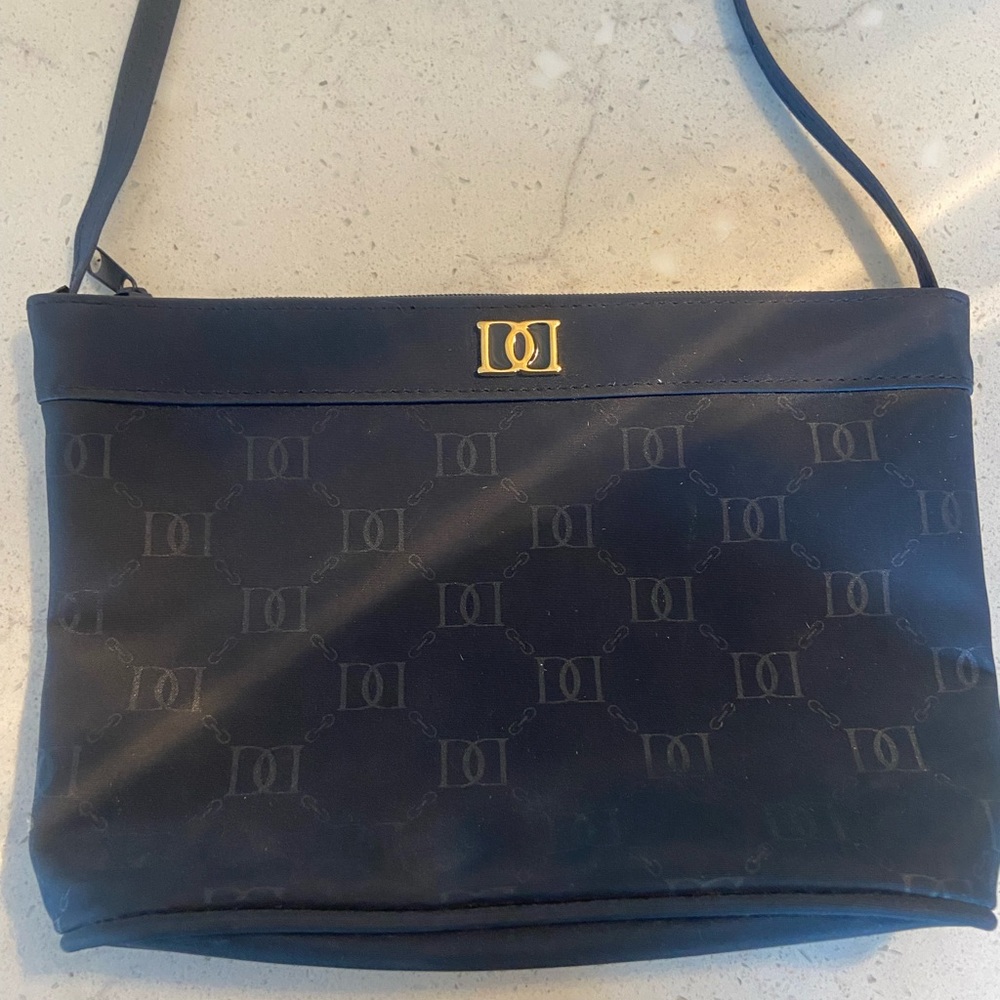 Cute pocketbook. Shoulder strap